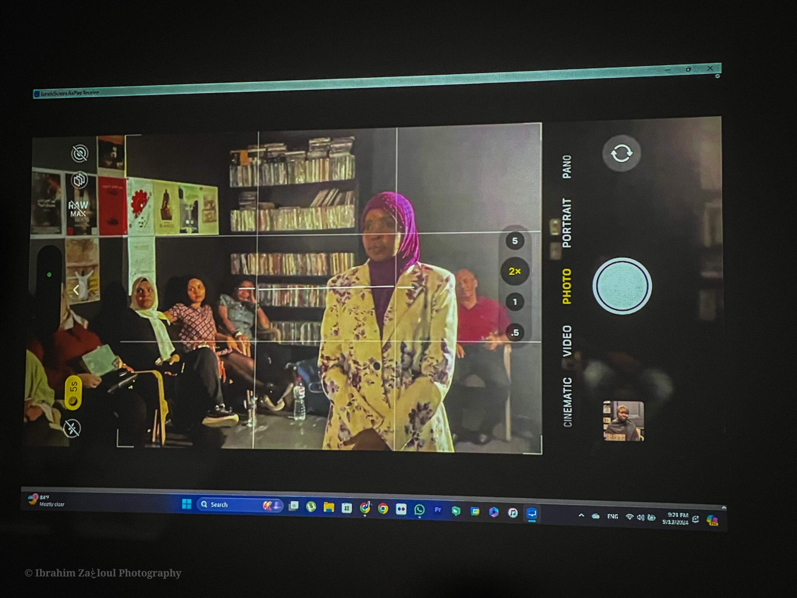 image of cell phone filming an interview